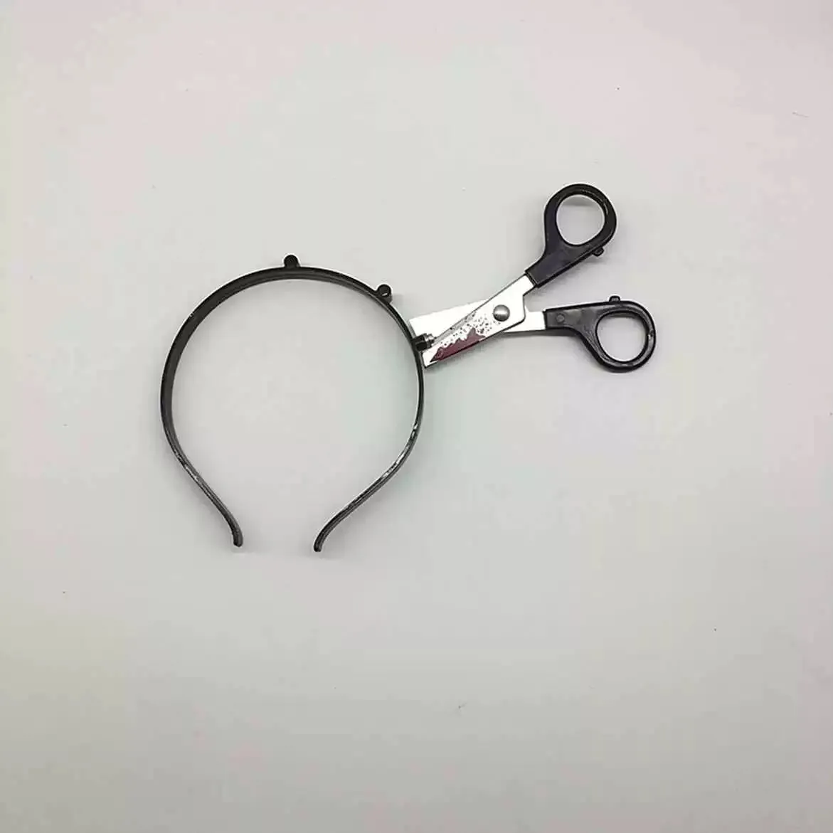 Tricky Halloween Headbands with Simulated Weapons
